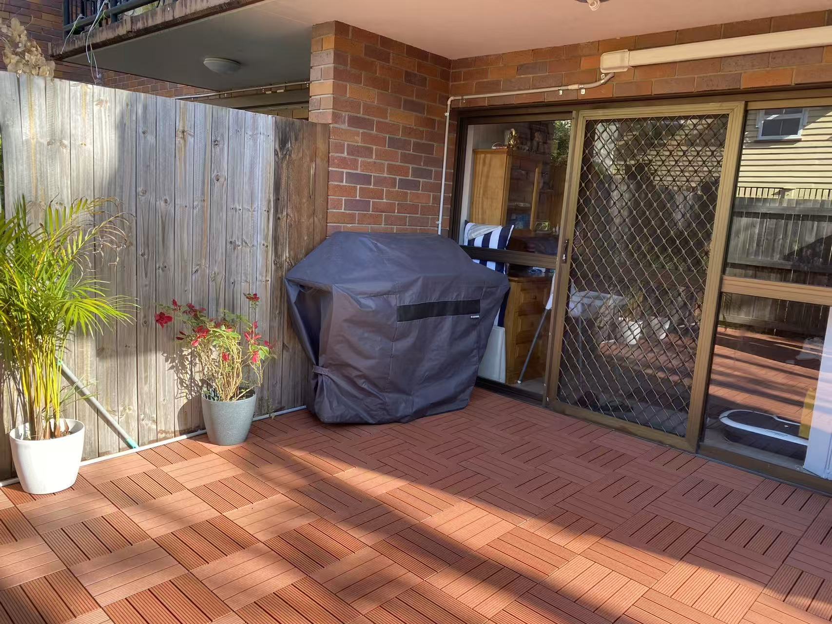 Courtyard finished with warm modular decking
